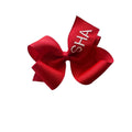 Red hair bow with SHA in white stitch